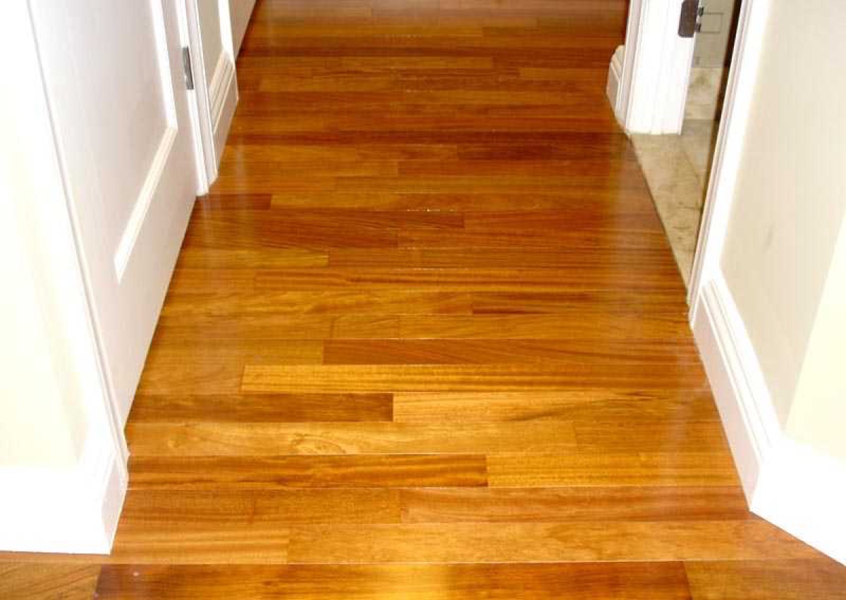 Honey-toned hardwood hallway, freshly finished